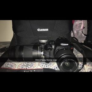 Canon Eos Rebel T6i Camera with a 75-300mm lens